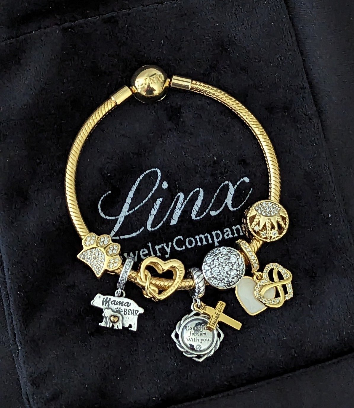 Linx Gold Snake Chain Bracelet with Gold and Silver Charms