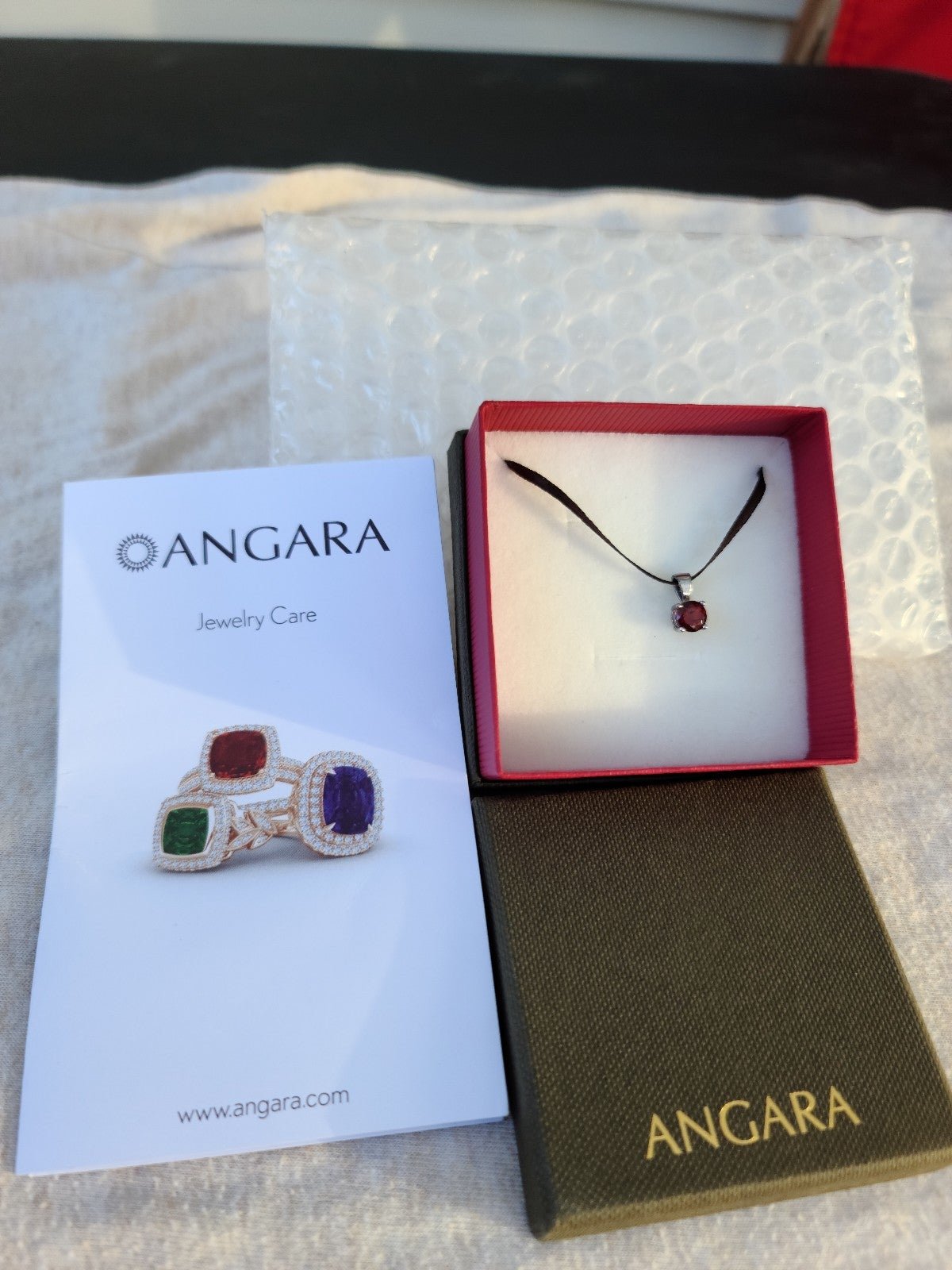 offering 100% Angara 1 carat Garnet Pendant Women offering 100% Angara 1 carat Garnet Pendant Women