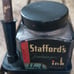 Antique fountain/dip pen, stand, and Stafford ink bottle.
