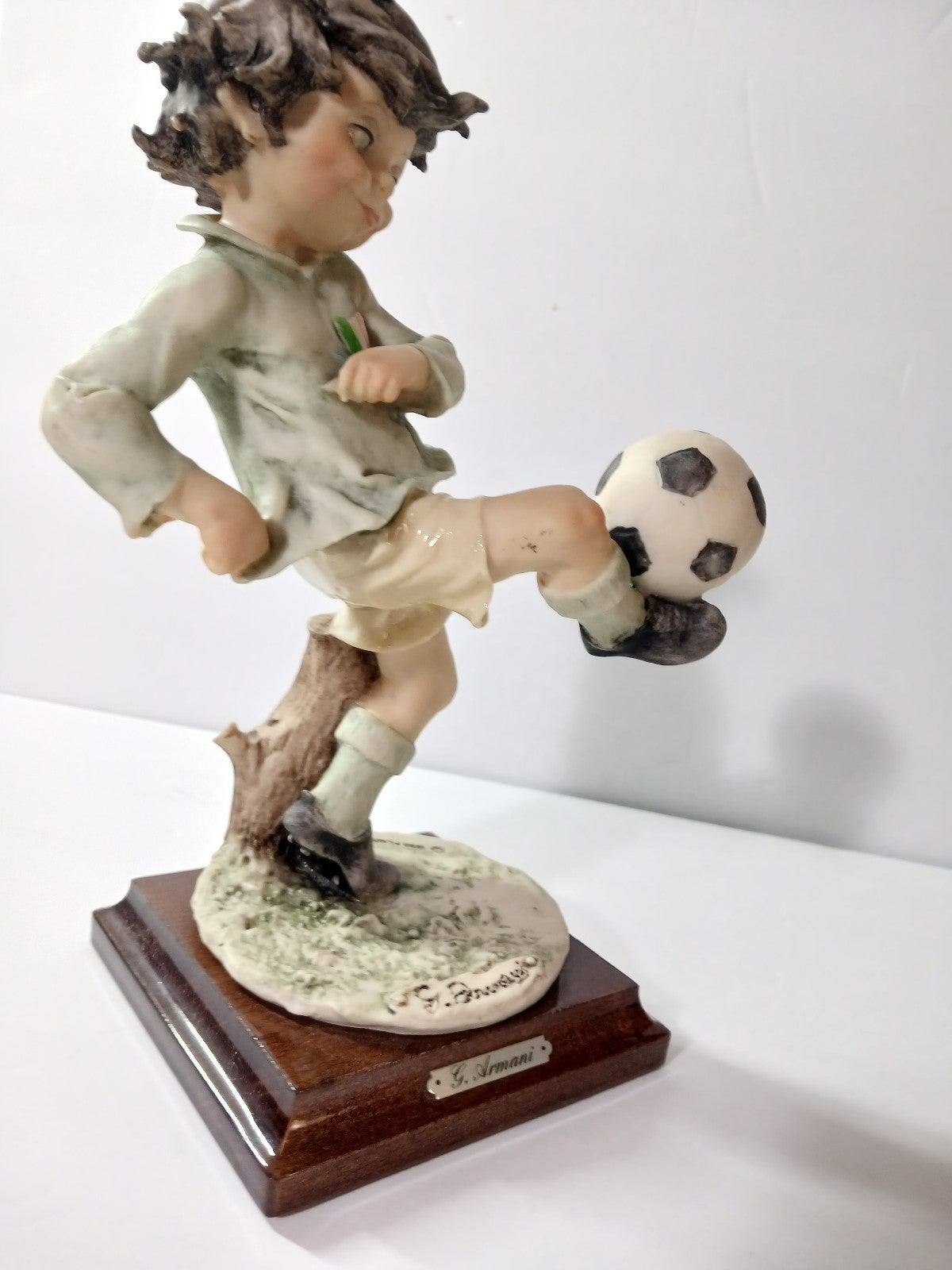 Giuseppe Armani 8 inch base figurine, soccer boy no box