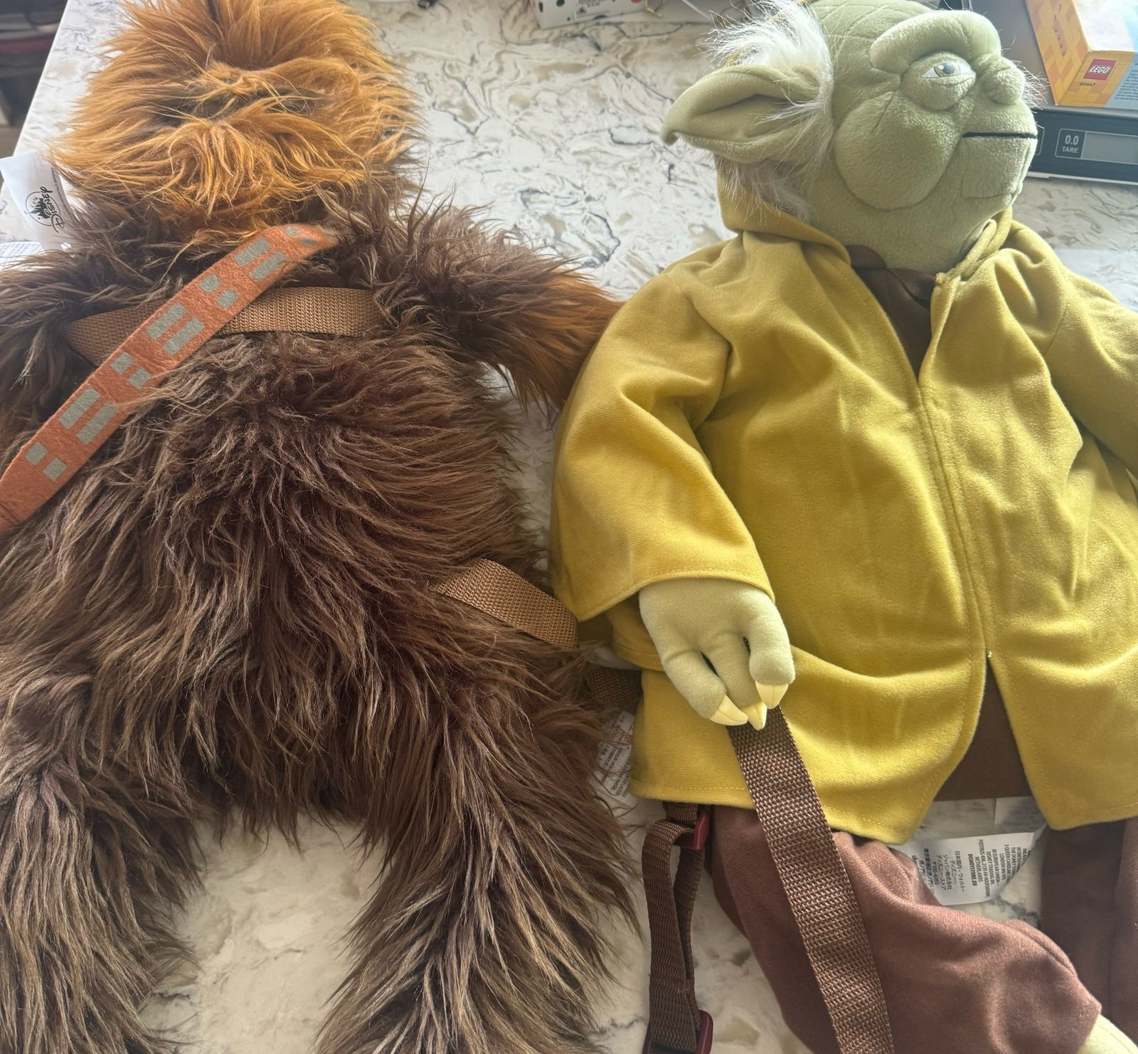 Disneyland Star Wars Chewbacca and Yoda backpacks.