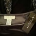 JACKIE JON, NWT, BLACK VELVET LOOK, MID LENGTH SKIRT. SIZE 14