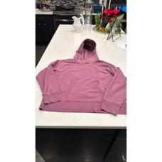 Lululemon women’s hoodie size 10, wine color, light spit on back see pictures.
