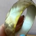 VINTAGE LEMONY YELLOW FACETED CHUNKY CELLULOID PLASTIC LUCITE BANGLE BRACELET