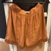 Reformation High-Waist Gold Silk Shorts
