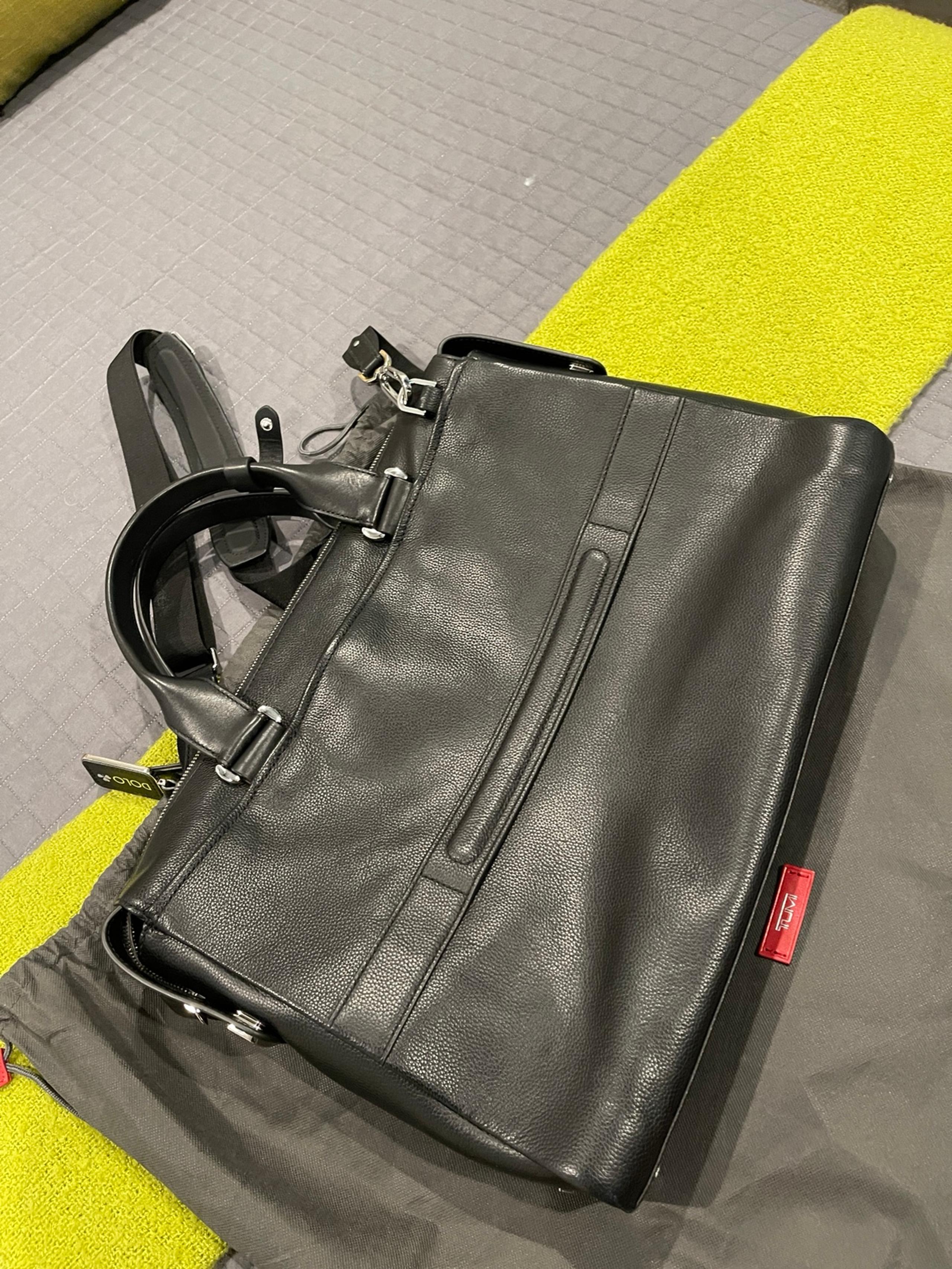 Tumi black leather shoulder bag