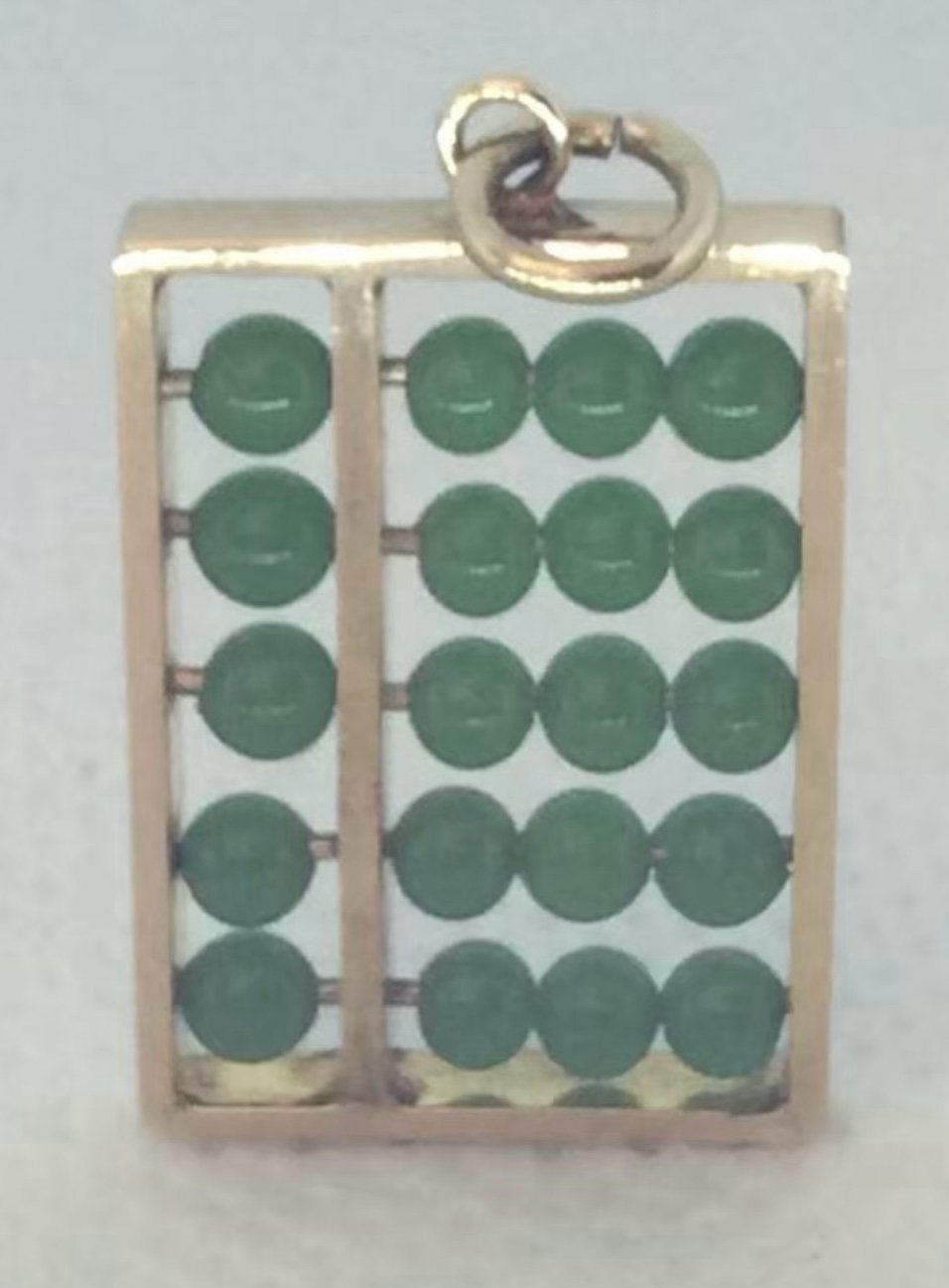14 K yellow gold 3D mechanical abacus charm with Jade beads 3.1 grams