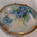 A antique porcelain hand-painted brooch