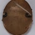 A antique porcelain hand-painted brooch