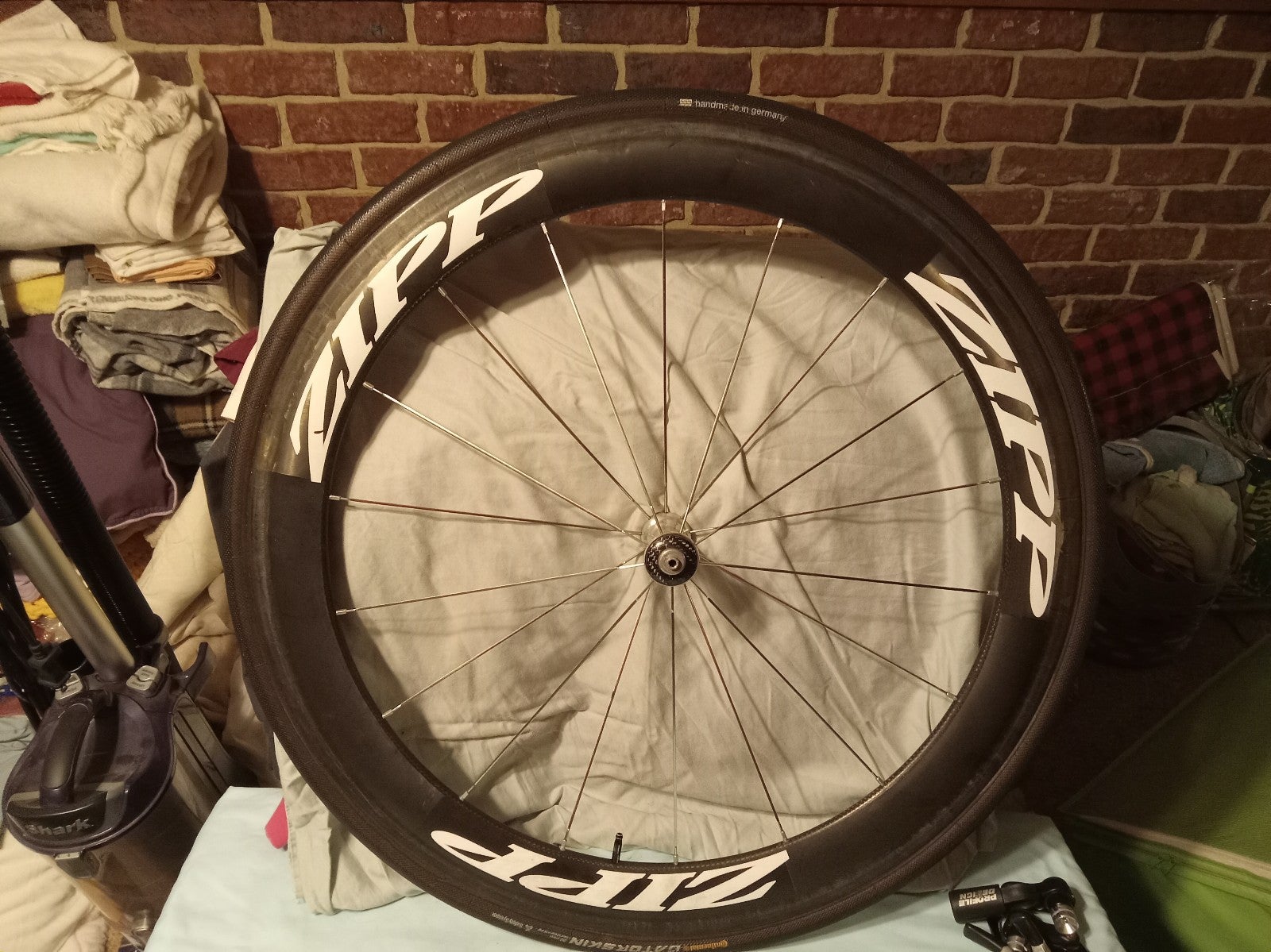 Zipp 404 aero tubular 18 bladed spoke front wheel with like new conti tire