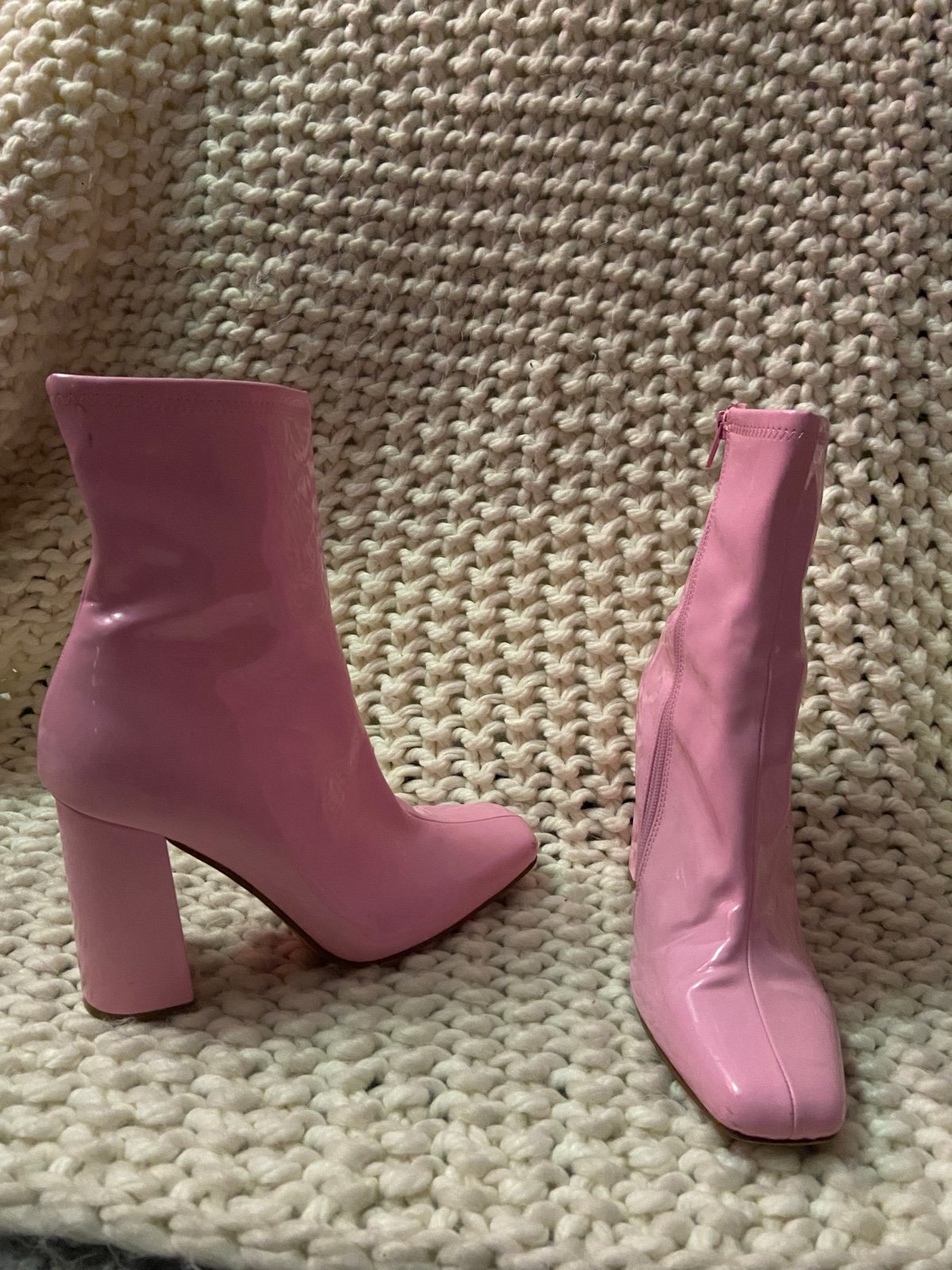 Pink Steve Madden boots with heel.