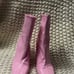 Pink Steve Madden boots with heel.