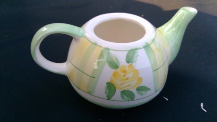 Yellow rose ceramic teapot
