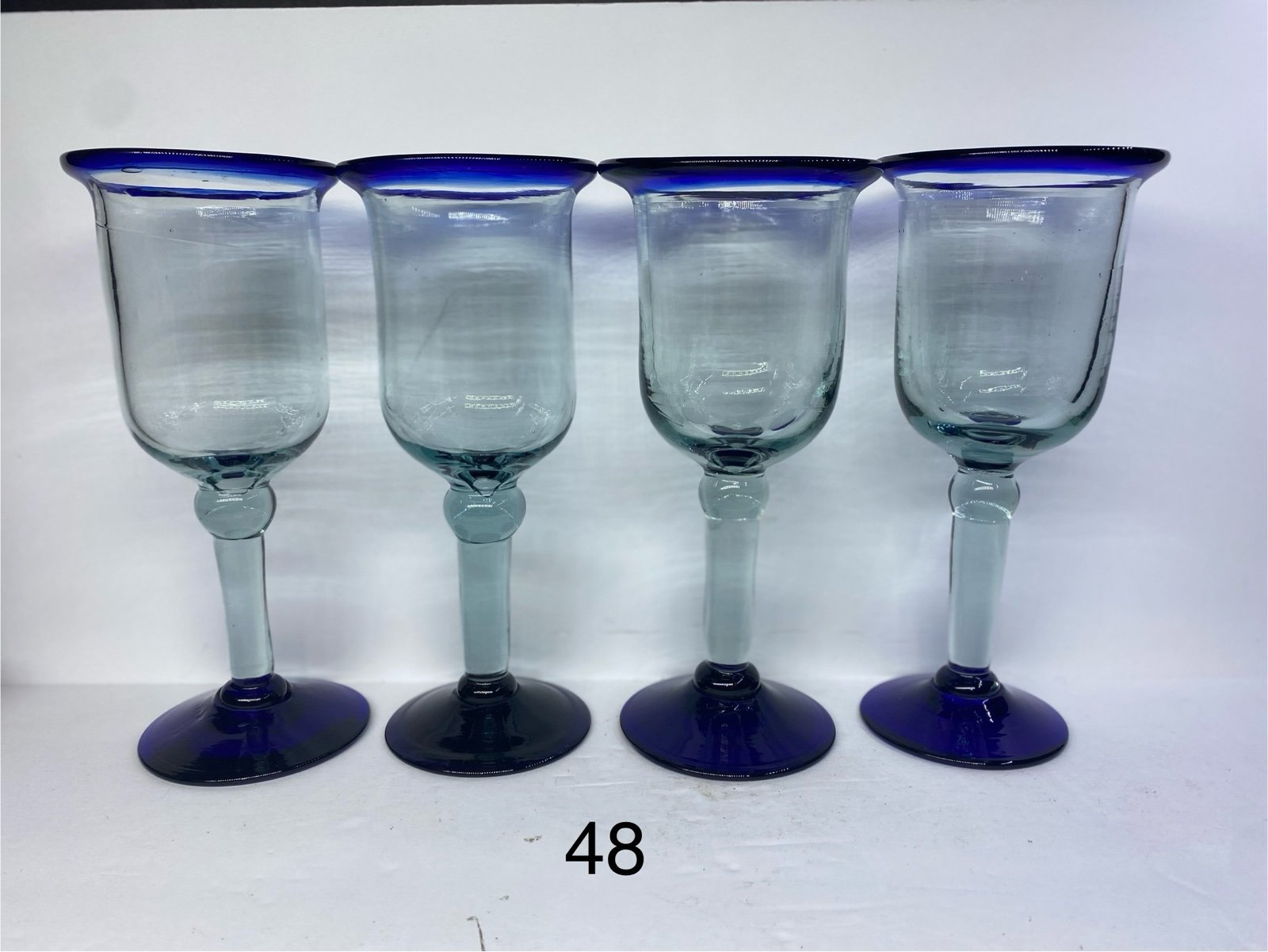 Set of (4) Pier 1 Hand Made Blown Wine Glasses Cobalt flared Rim & blue Base Mad