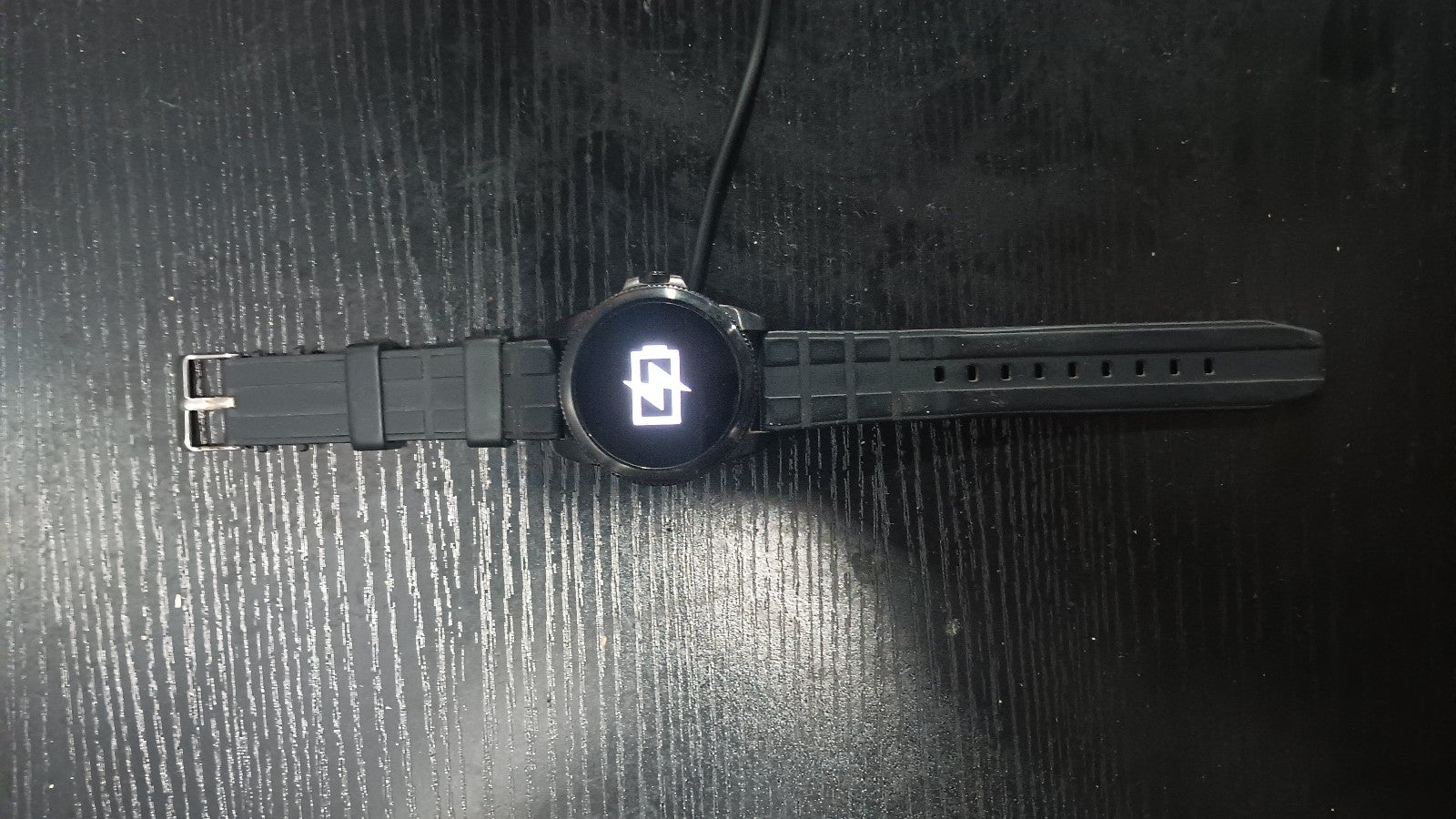 Black Fossil Smart Watch With Power Cord