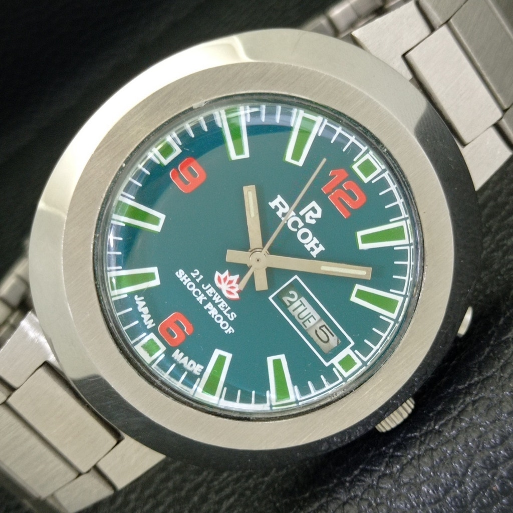 Vintage 1977 Ricoh Automatic Mens Silver Watch W/daydate & Green accents