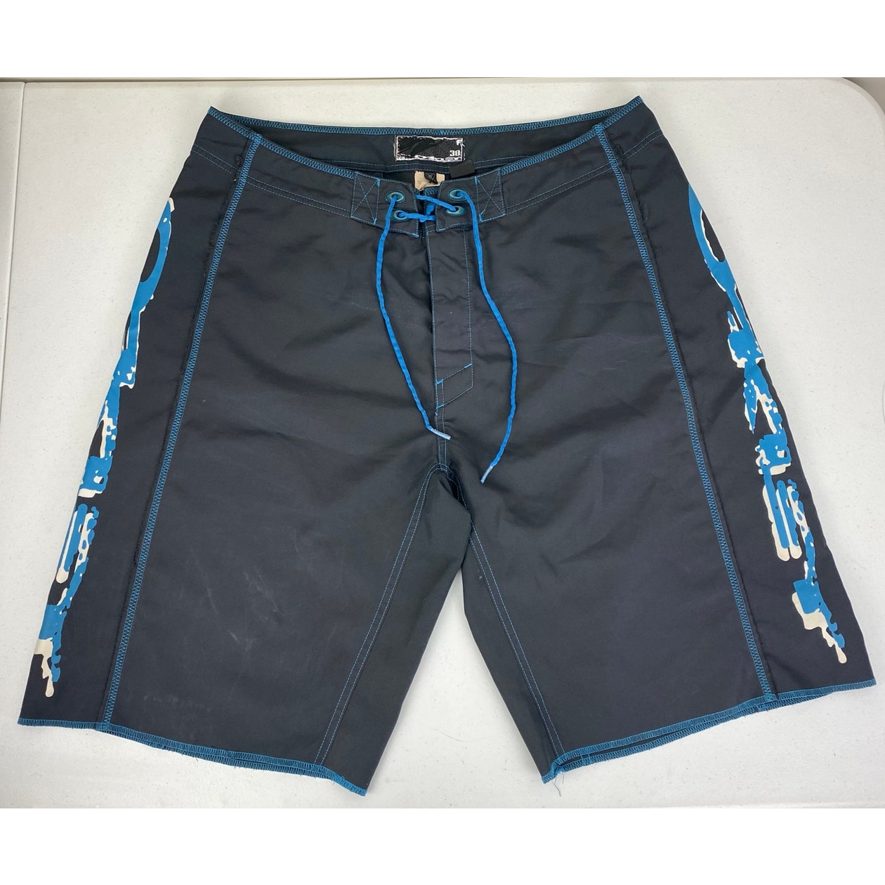 VTG Y2K 2006 Oakley graphic spell-out baggy board shorts swim trunks, 38