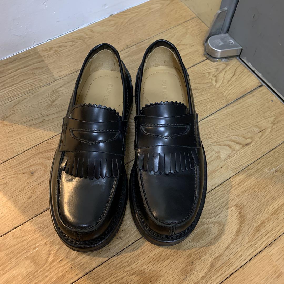 Black loafers with fringe, size 35.