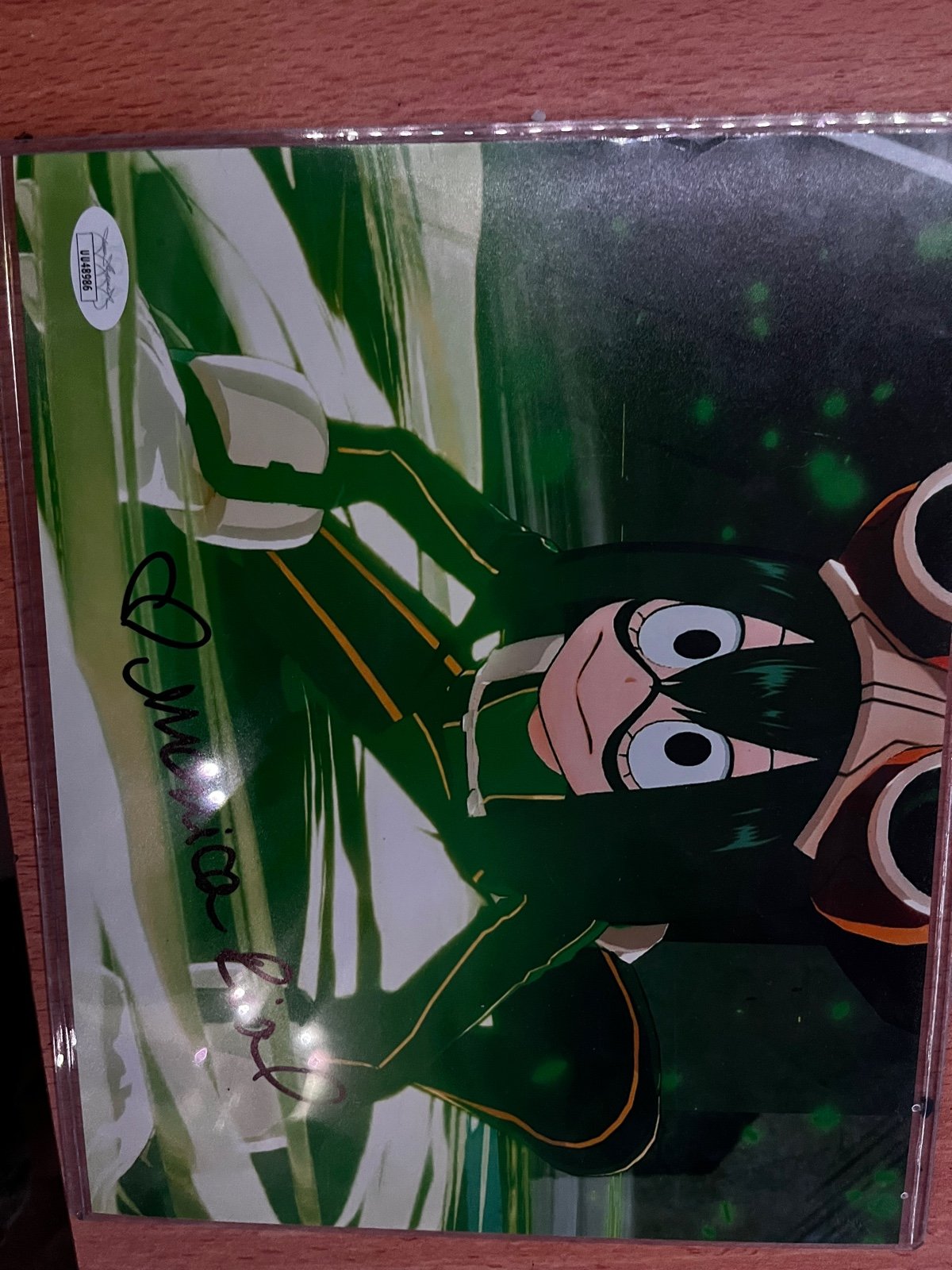 Autographed Tsuyu Asui Photo in protector
