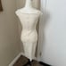 Black and Cream Body Con Dress Size Small It does have a couple marks on the bac