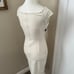 Black and Cream Body Con Dress Size Small It does have a couple marks on the bac