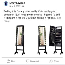 A black led light mirror with storage on the inside it also rotates and stands