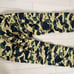A BATHING APE Camouflage Pants.