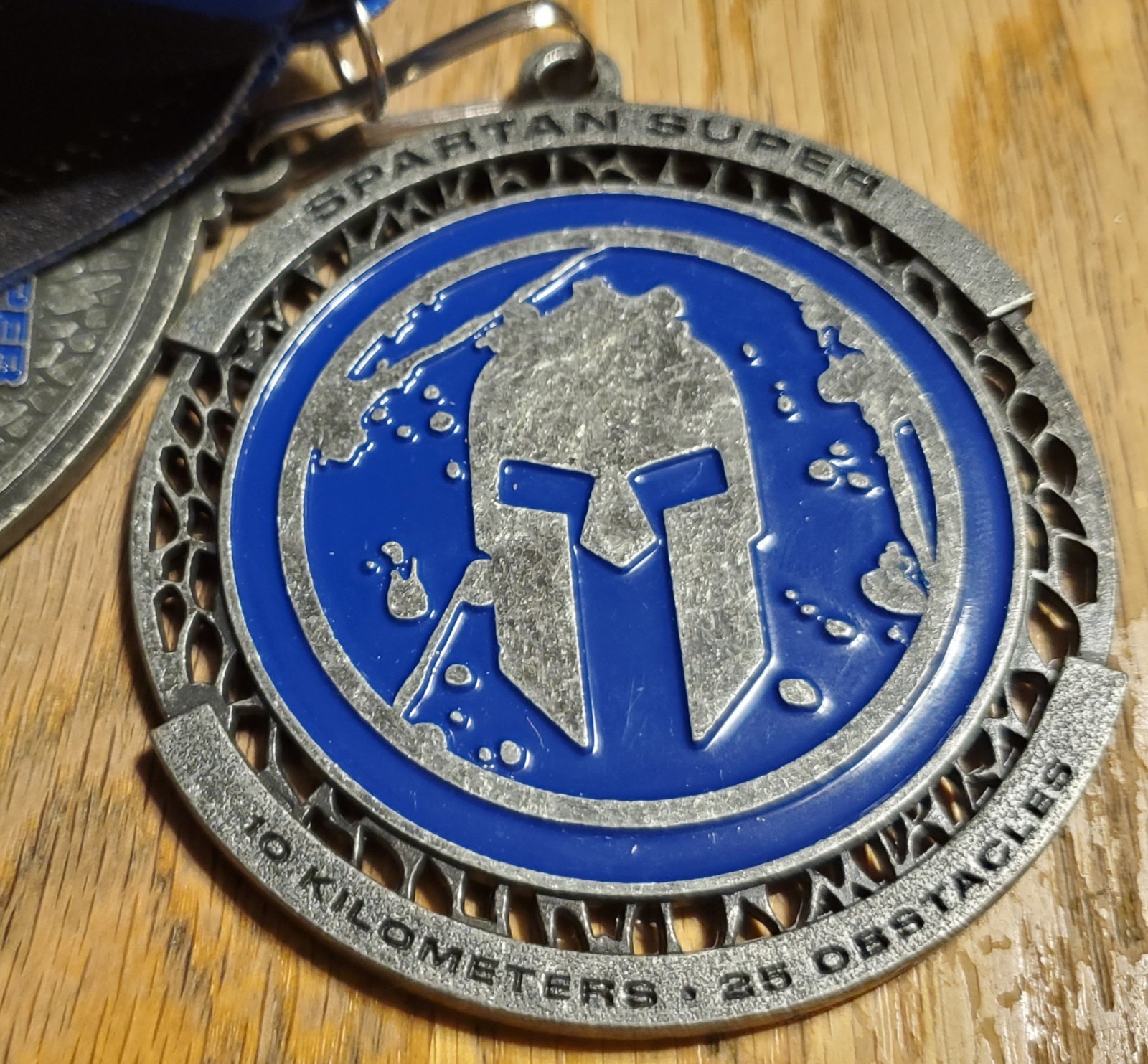 2024 Spartan Super 10k 25 obstacle finisher medal with trifecta wedge nwot