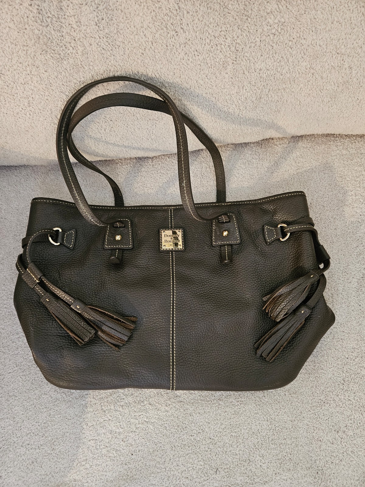 Dooney and Bourke Dark brown pebble grain leather tote/shoulder bag.