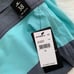 *flaw NWT O’Neill - Aqua gray Informant mid-length board shorts, sz 38