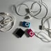 iPod Shuffle x 3 with chargers