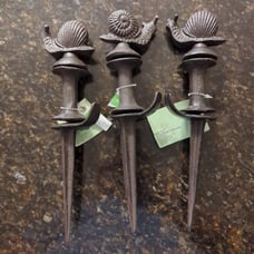 Set of 3 new cast iron snail topped hose guides