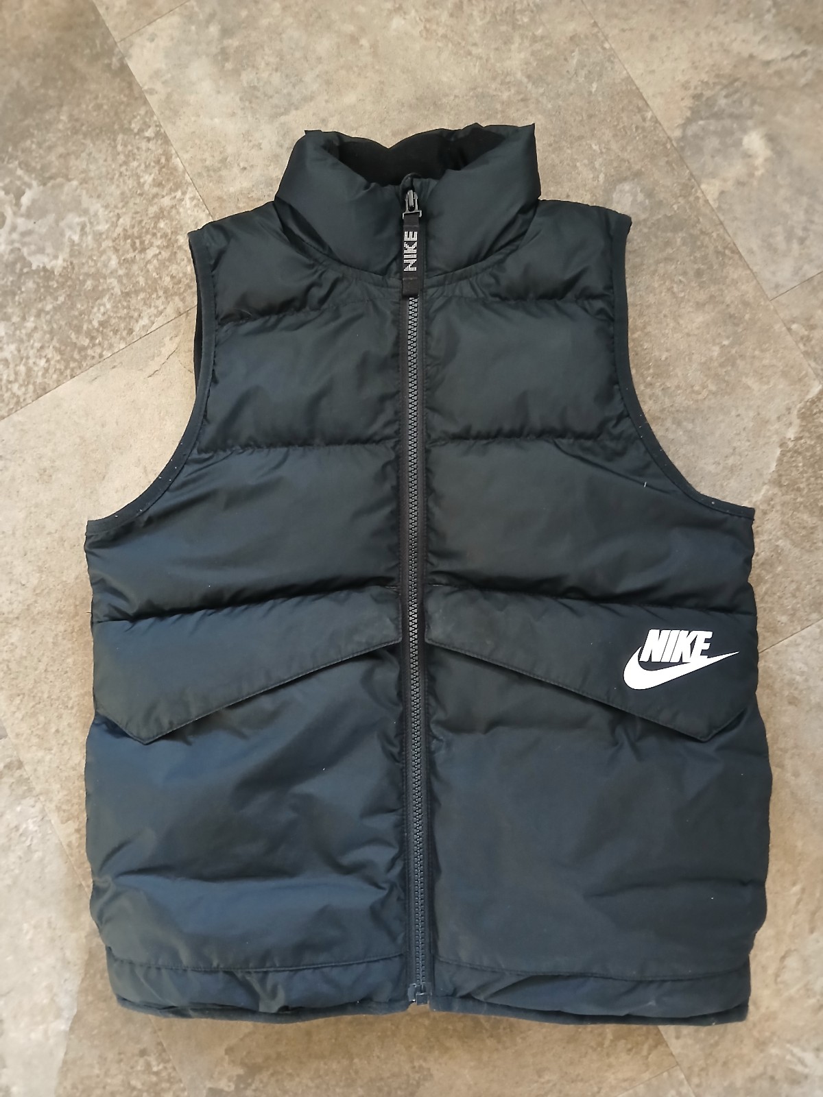 Nike solid black puffer vest (size small)