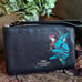 Authentic COACH pebbled leather zip top wristlet Wonder Woman