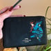 Authentic COACH pebbled leather zip top wristlet Wonder Woman