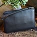Authentic COACH pebbled leather zip top wristlet Wonder Woman