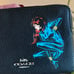 Authentic COACH pebbled leather zip top wristlet Wonder Woman