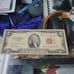 Red ink 2 dollar bill
