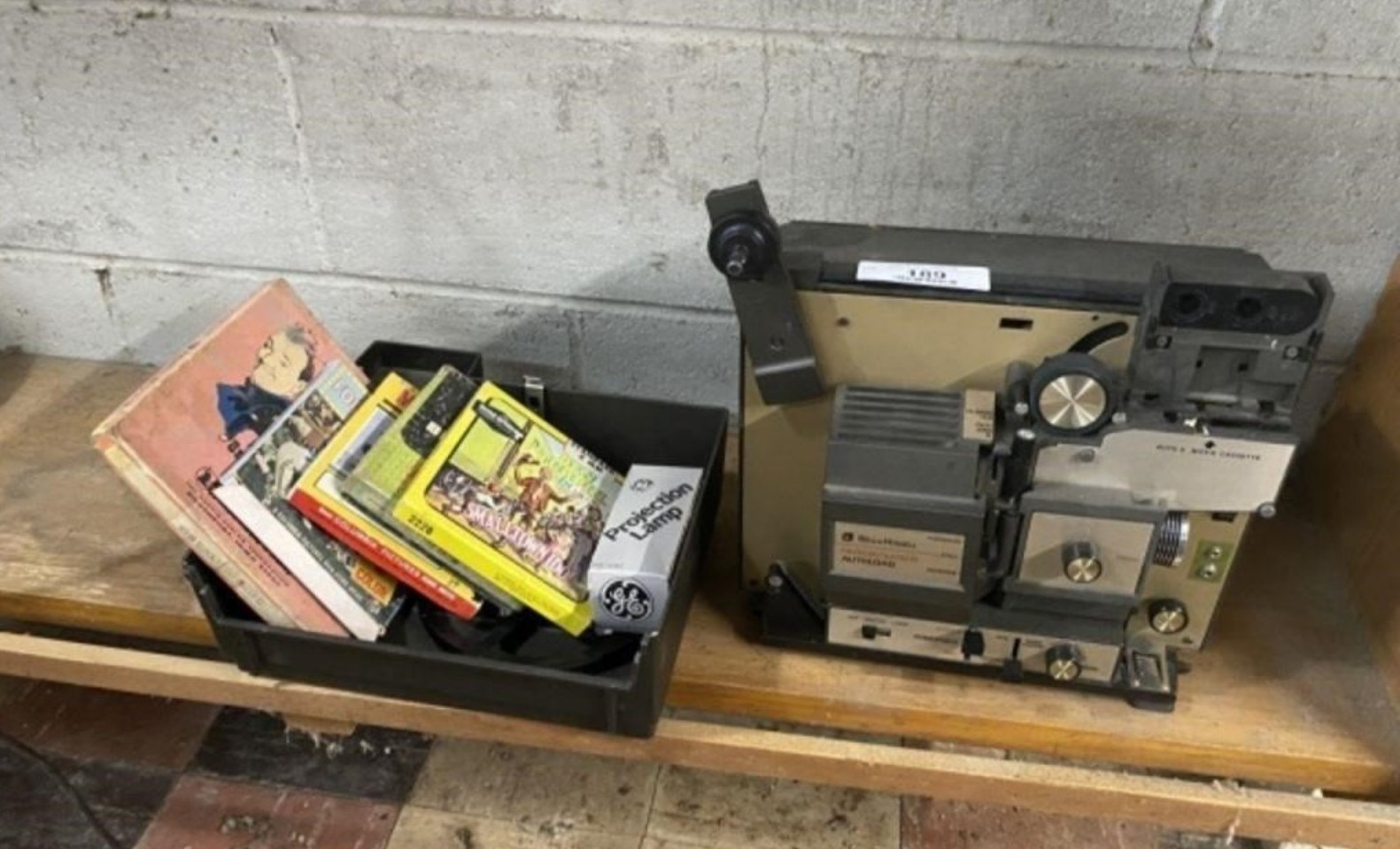 Vintage Bell and Howell 8mm Projector w/ movies bulbs