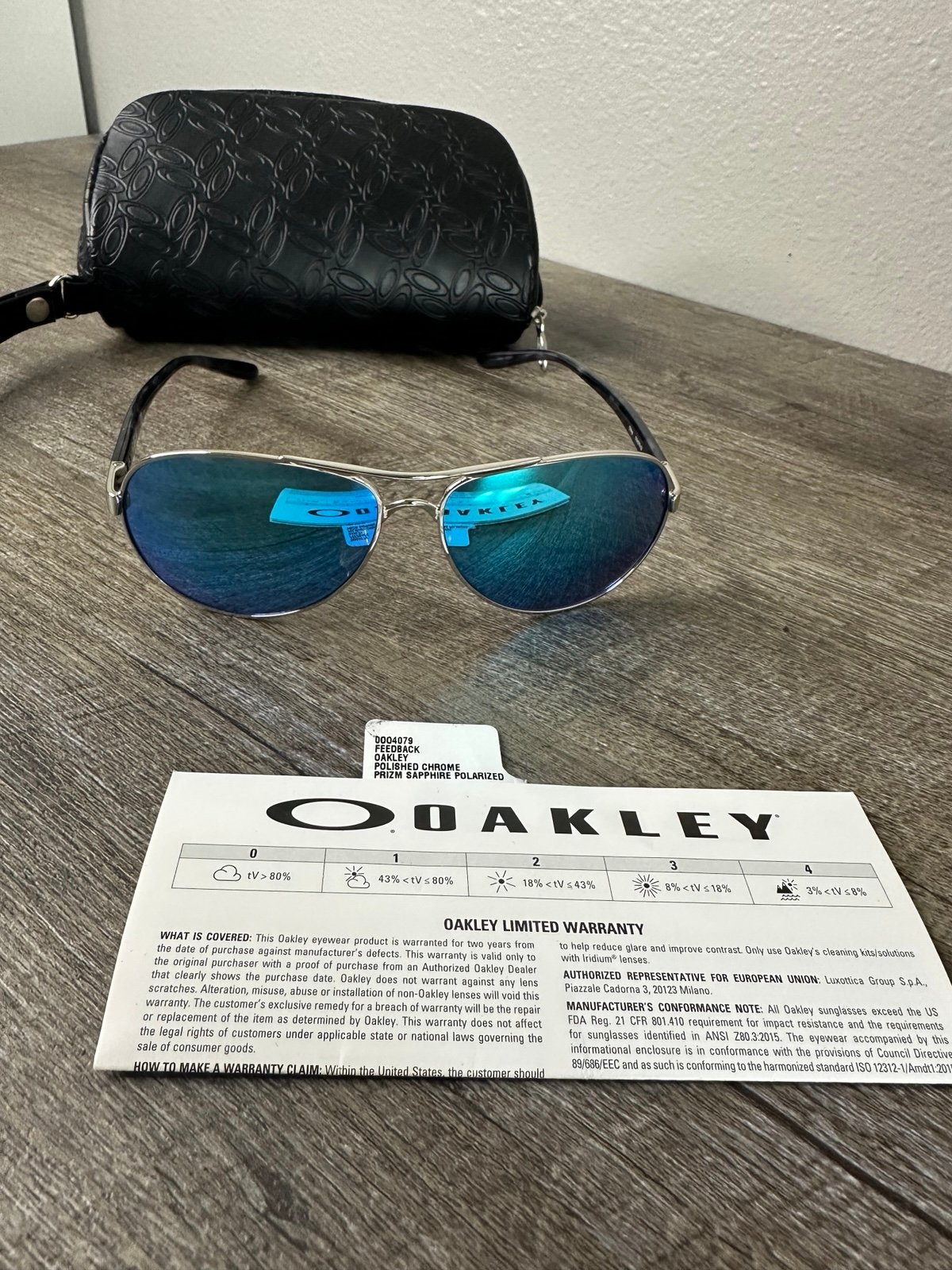 OAKLEY OO4079 Prizm Sapphire Polarized Lenses, Polished Chrome Frame