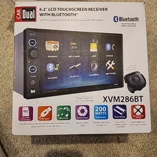 The item shown is a Dual Electronics XVM286BT car stereo receiver with a...