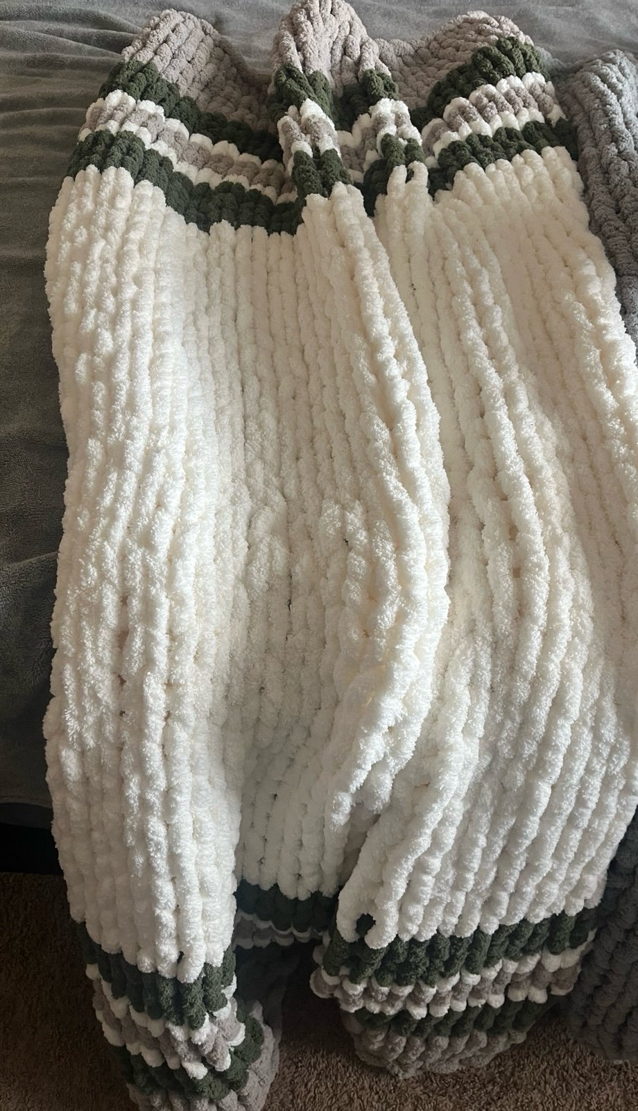 Beige, white and green handmade chunky knit blanket