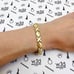10K Yellow Gold 7mm Hollow XOXO Hugs & Kisses Bracelet 8″
