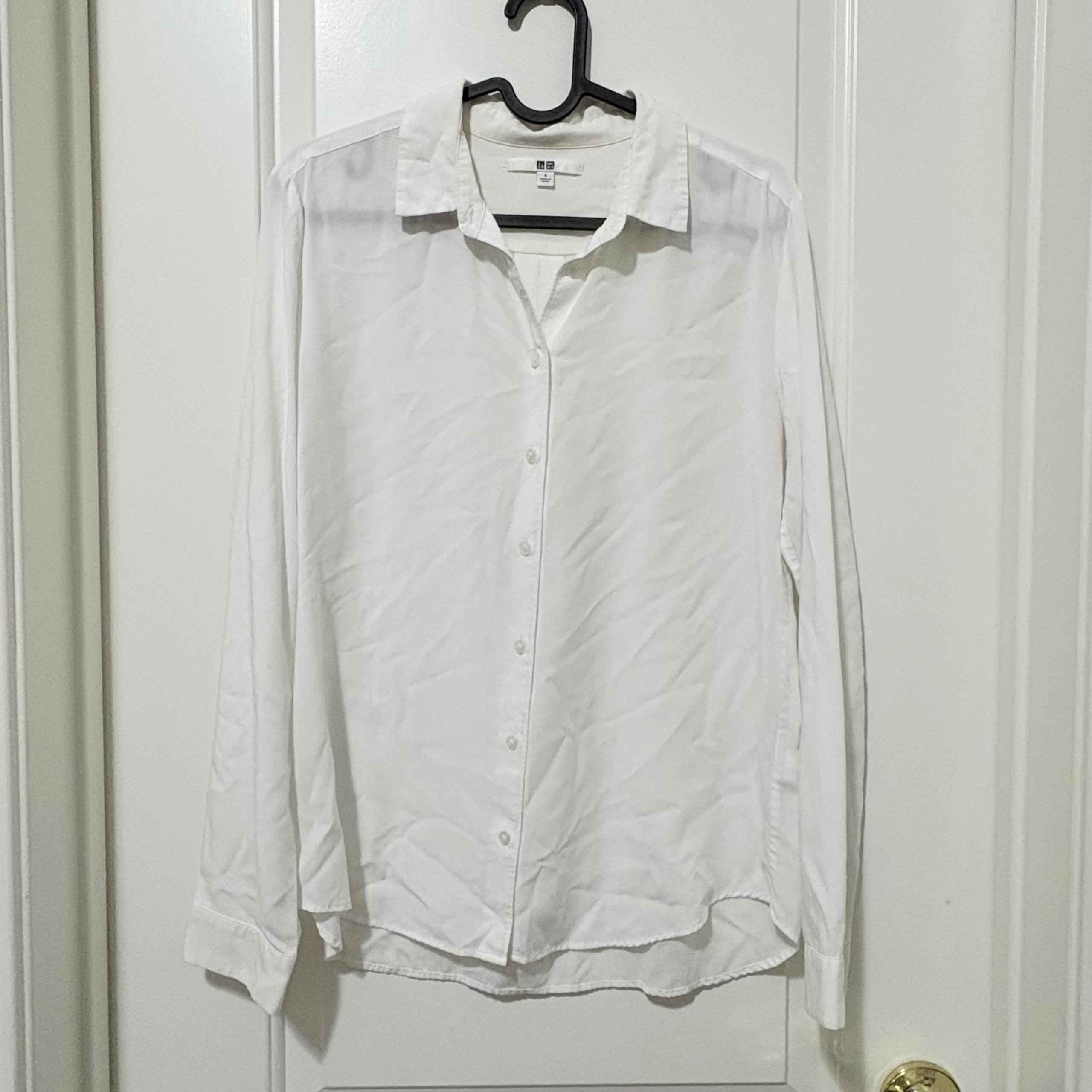 White UNIQLO Shirt.