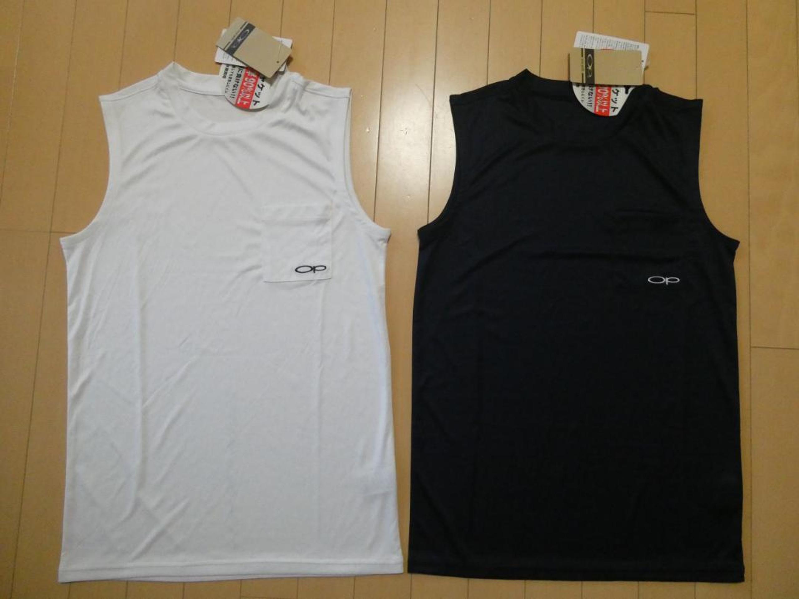 Two unused size M Ocean Pacific amphibious tank tops for men.