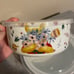 Disney winnie the pooh honeypot floral set of two round ceramic food storage con