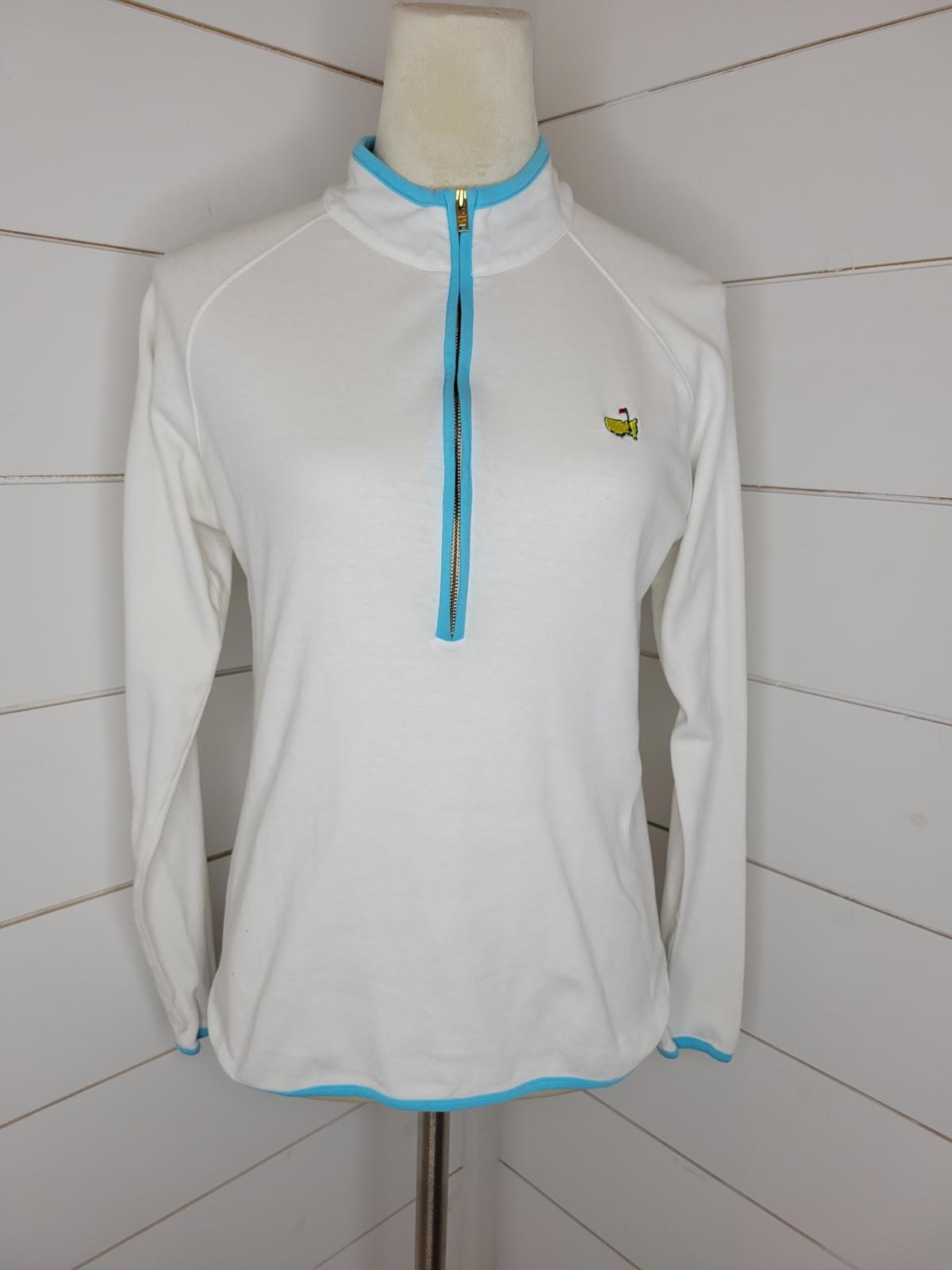 The Masters. Magnolia Lane. Medium white with blue detail pullover shirt
