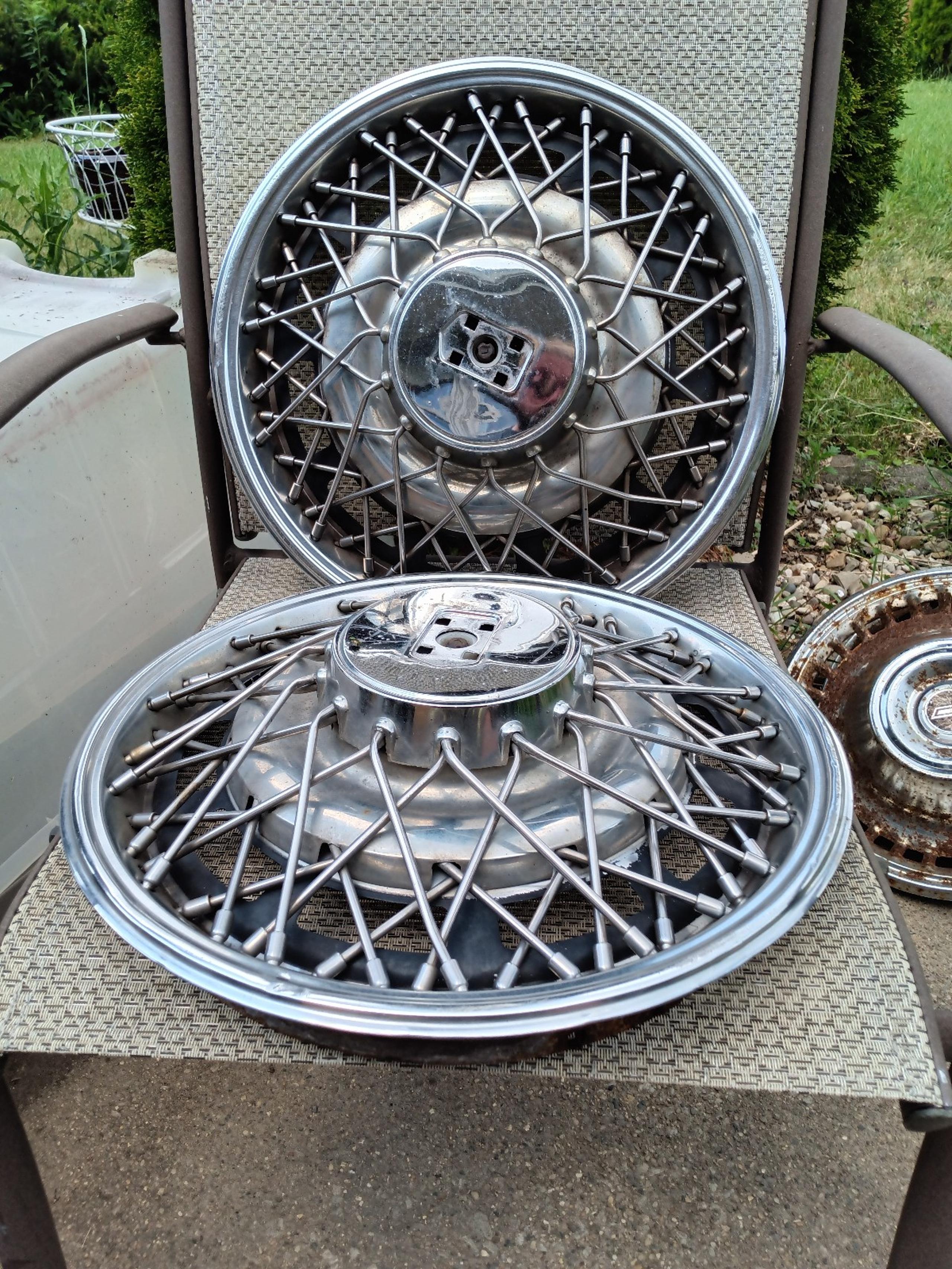 2-15" Oldsmobile wire toronado hubcaps