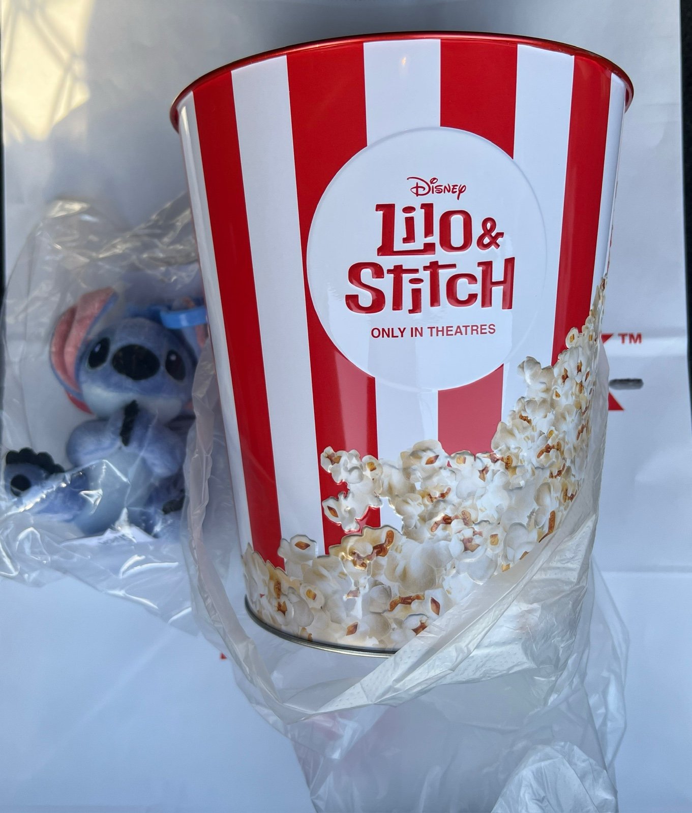 Stitch popcorn bucket tin and plush with magnets
