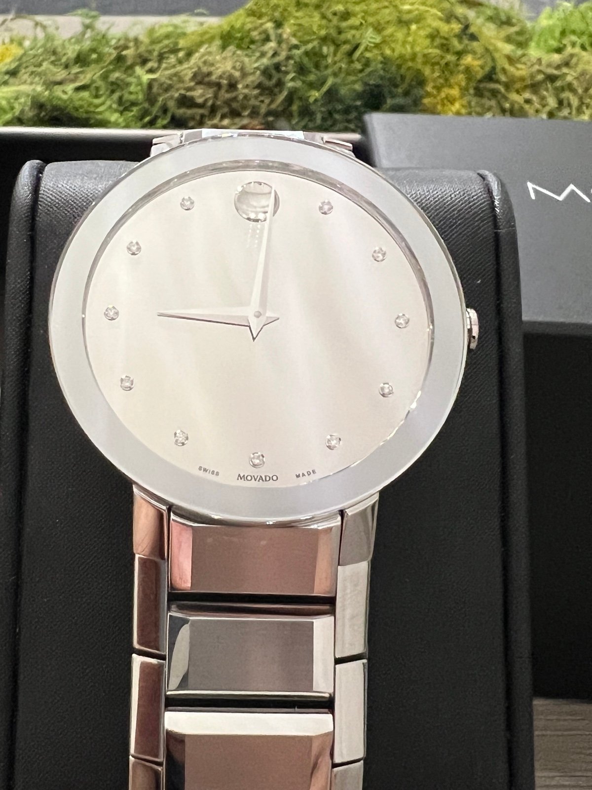Movado sappire mirror silver tone
